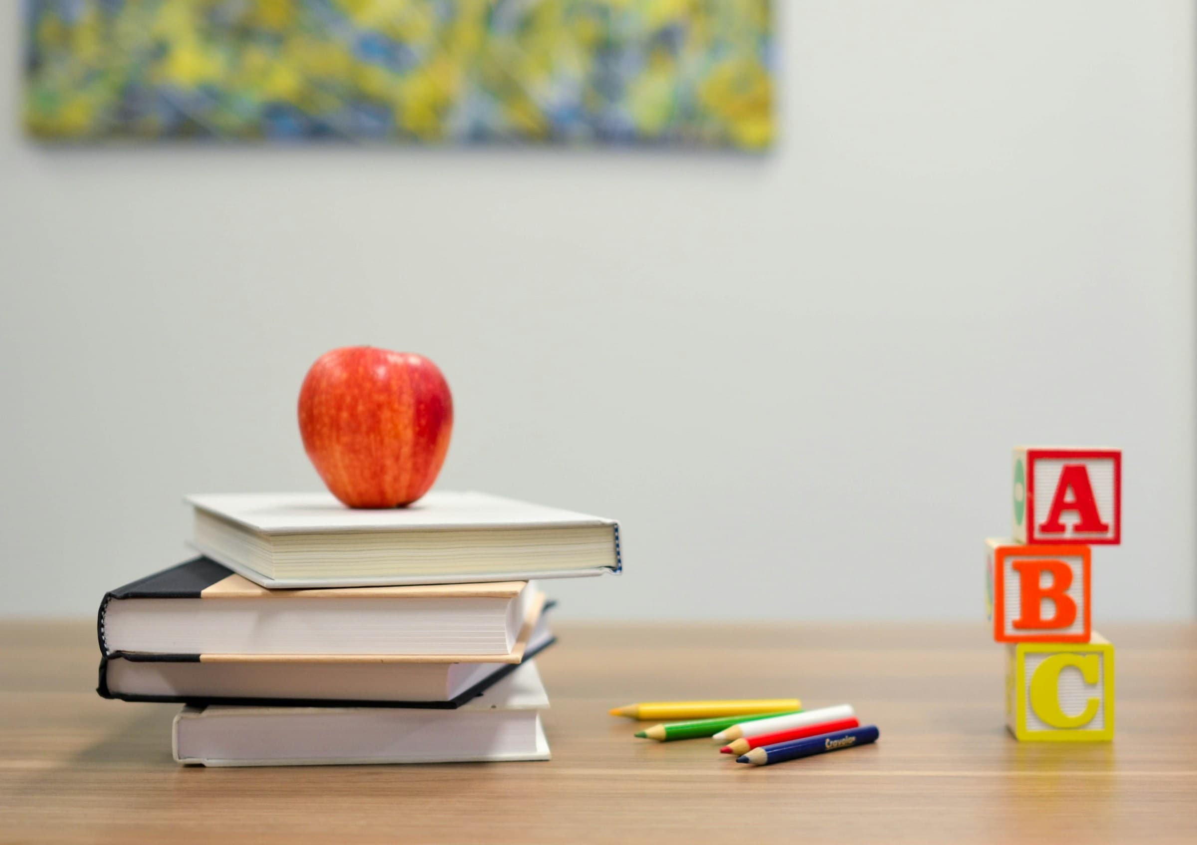 Books, coloured pencils, and alphabet blocks — choosing a school in the UAE